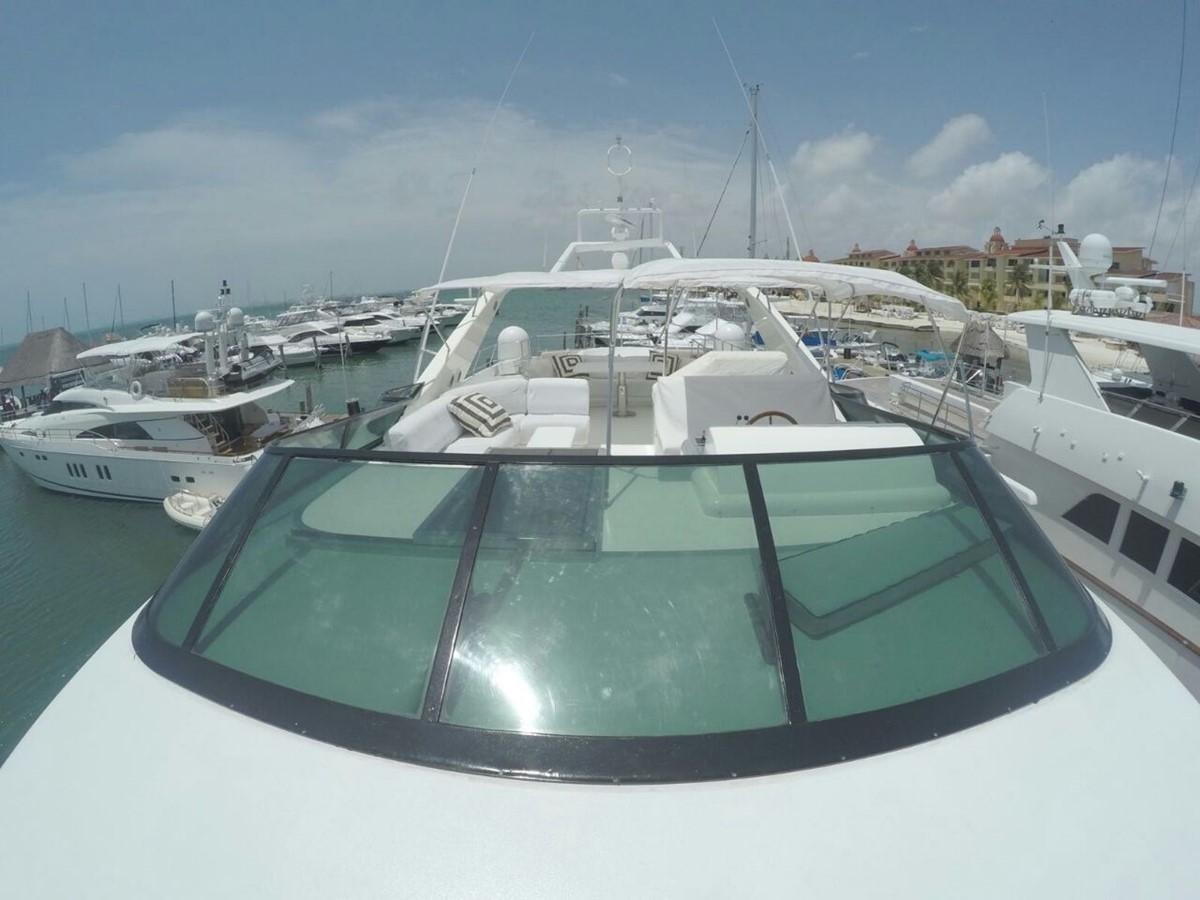 a boat in a harbor aboard AZIMUT 100' Yacht for Sale