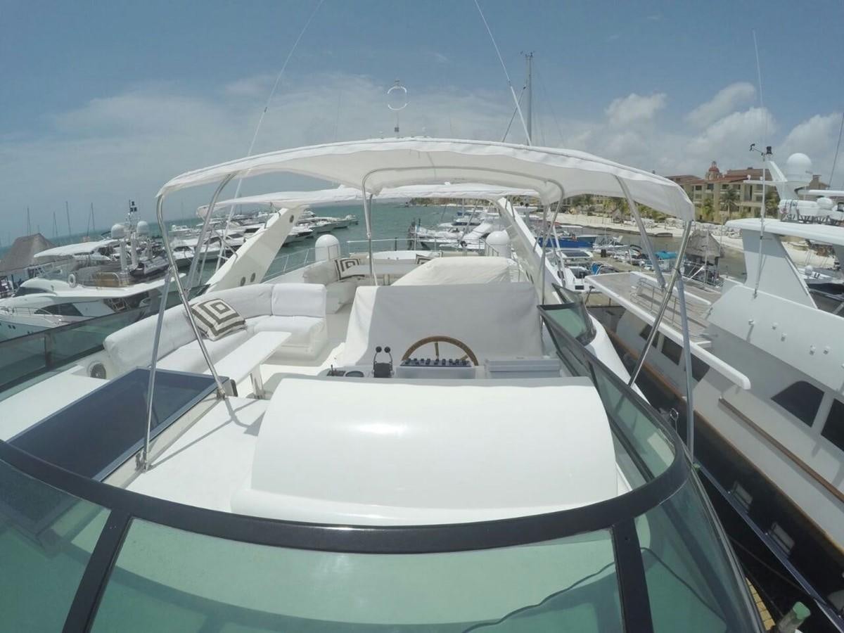 a group of boats in a harbor aboard AZIMUT 100' Yacht for Sale