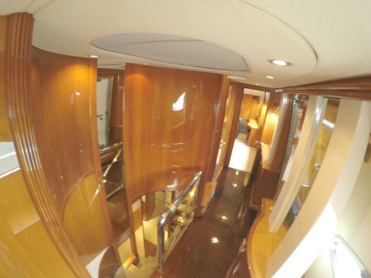 a hallway with a glass door aboard AZIMUT 100' Yacht for Sale