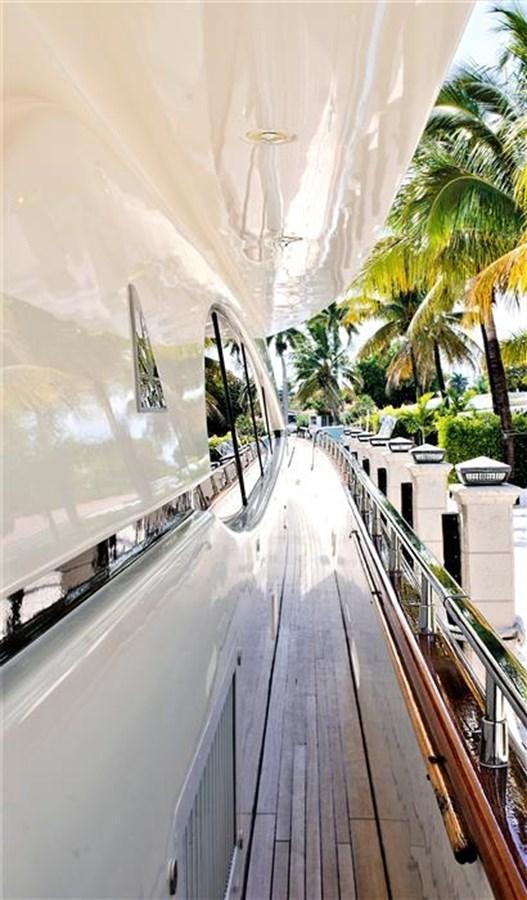 a long wooden walkway aboard CAROBELLE Yacht for Sale