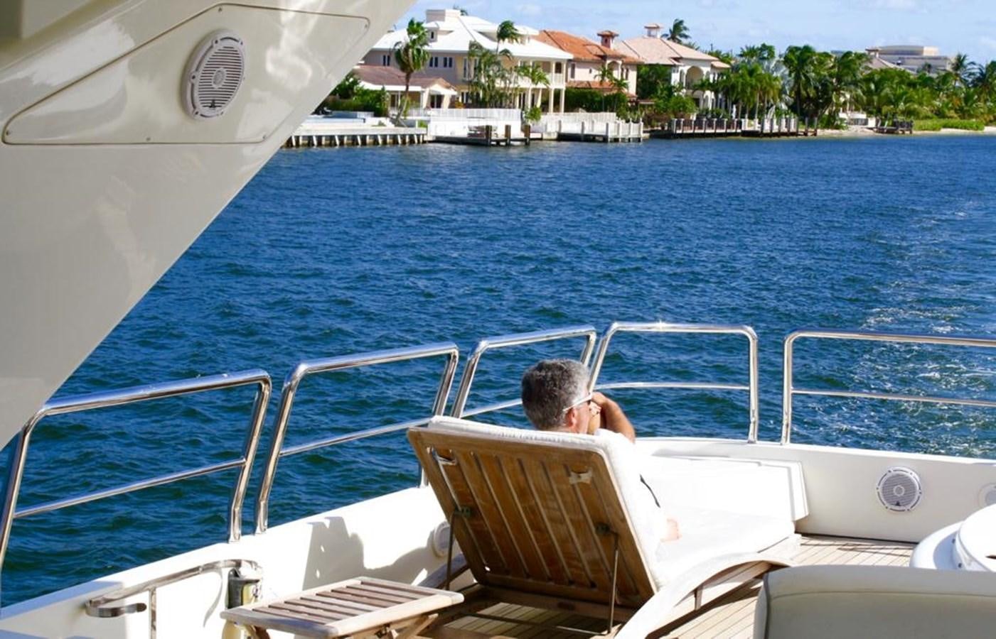 a person sitting on a boat aboard CAROBELLE Yacht for Sale