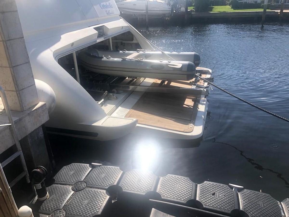 a boat on a dock aboard CAROBELLE Yacht for Sale