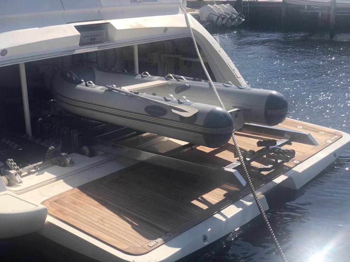 a boat on a dock aboard CAROBELLE Yacht for Sale