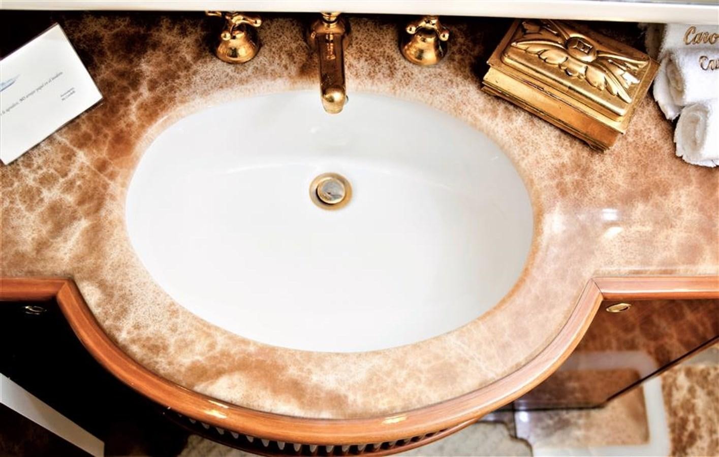 a sink with a faucet aboard CAROBELLE Yacht for Sale