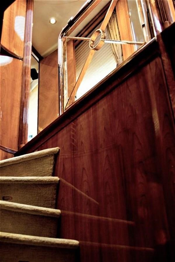 a wooden door with a cross aboard CAROBELLE Yacht for Sale