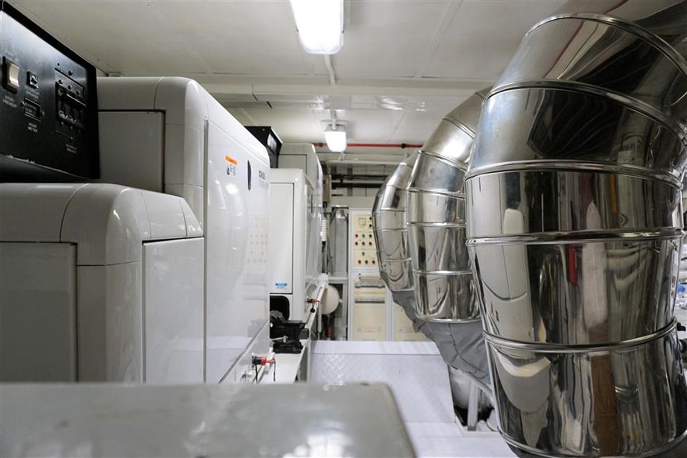 a room with several machines aboard CAROBELLE Yacht for Sale