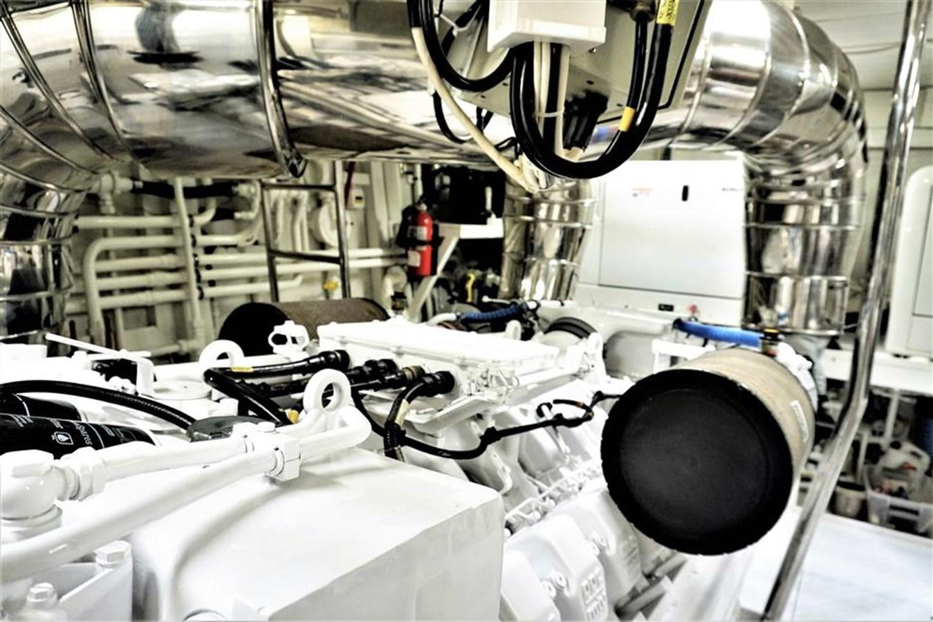 a room with a computer and equipment aboard CAROBELLE Yacht for Sale