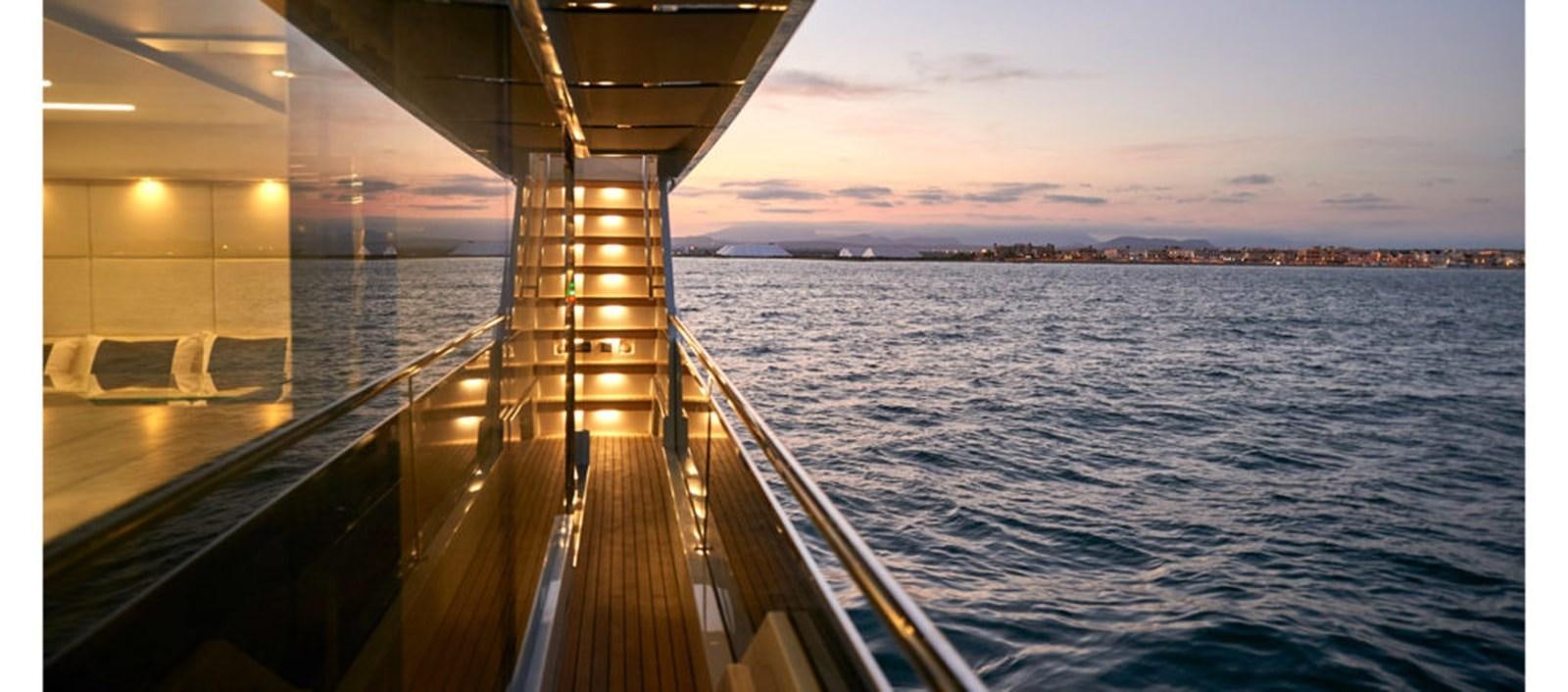 a wooden dock over a body of water aboard AST100CENROY Yacht for Sale