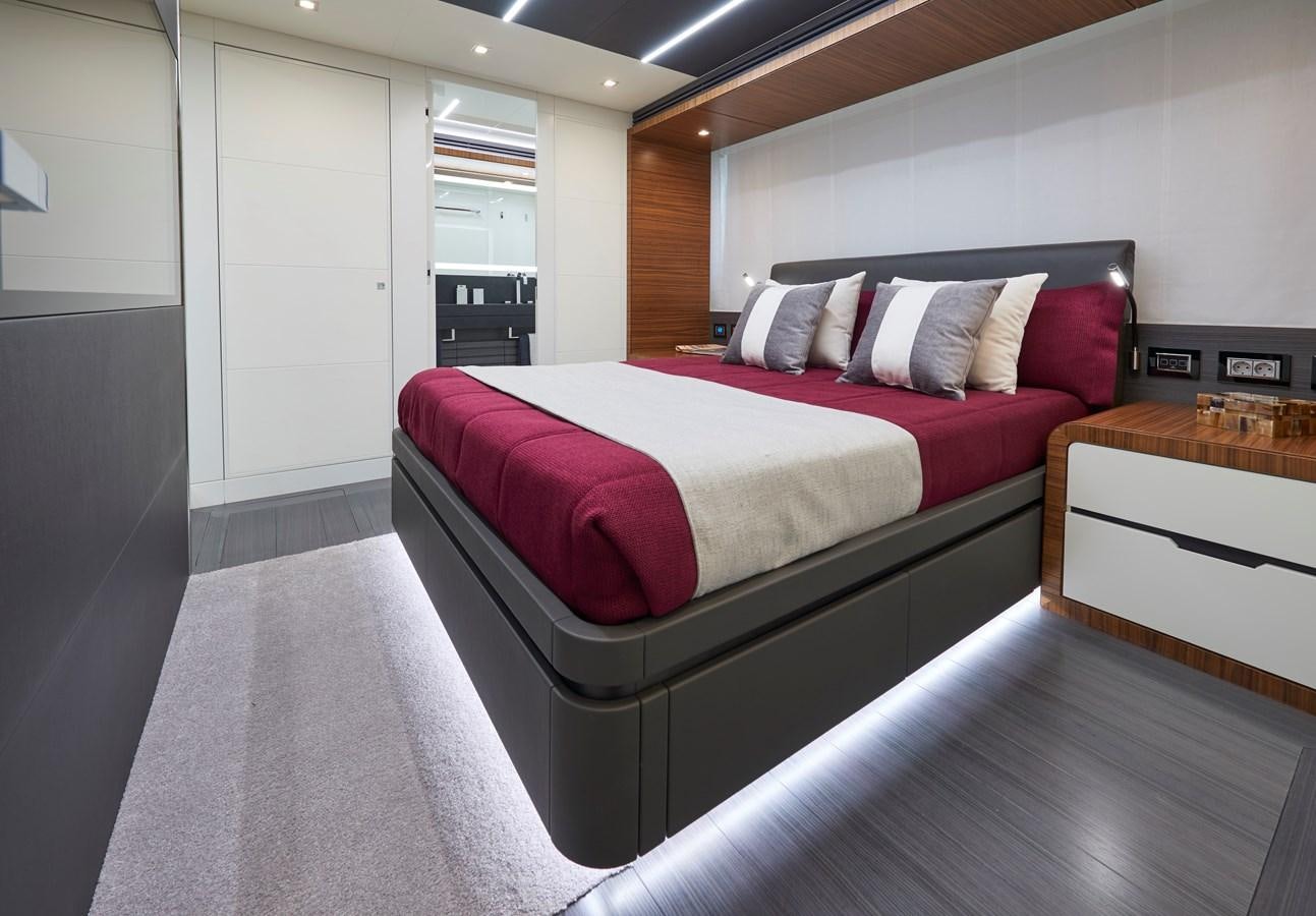 a bed in a room aboard AST100CENROY Yacht for Sale