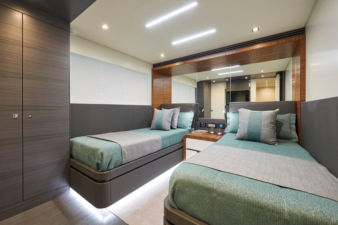 a couple of beds in a hotel room aboard AST100CENROY Yacht for Sale
