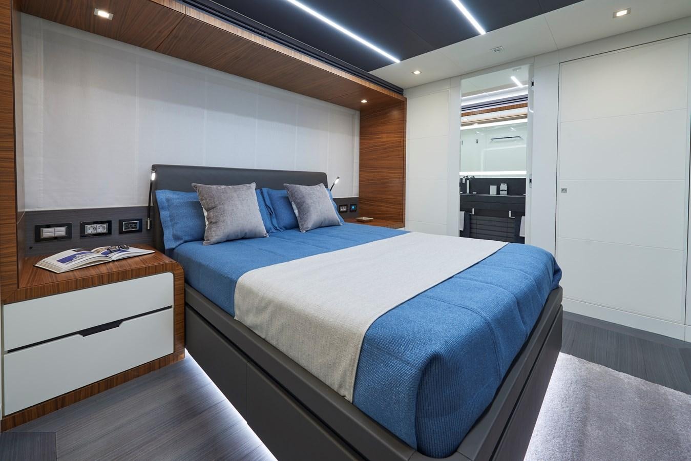a bed in a room aboard AST100CENROY Yacht for Sale