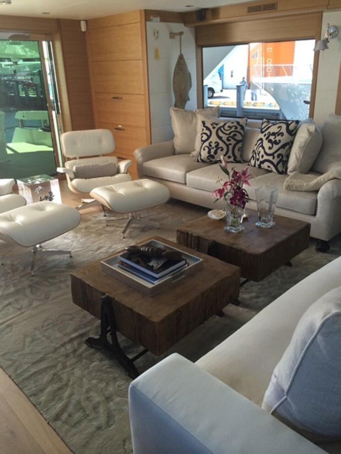 a living room with a large window aboard MAGALITA V Yacht for Sale