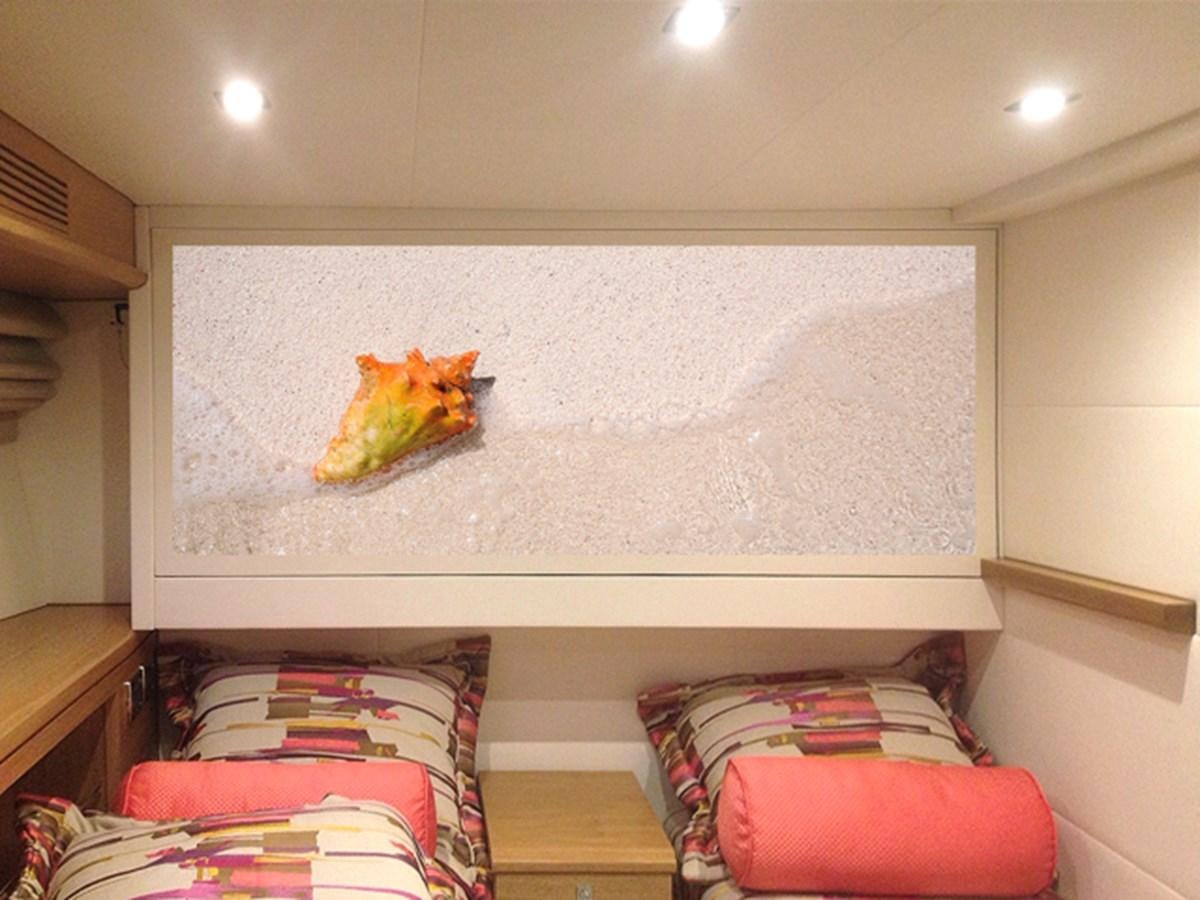 a cat on a shelf aboard MAGALITA V Yacht for Sale