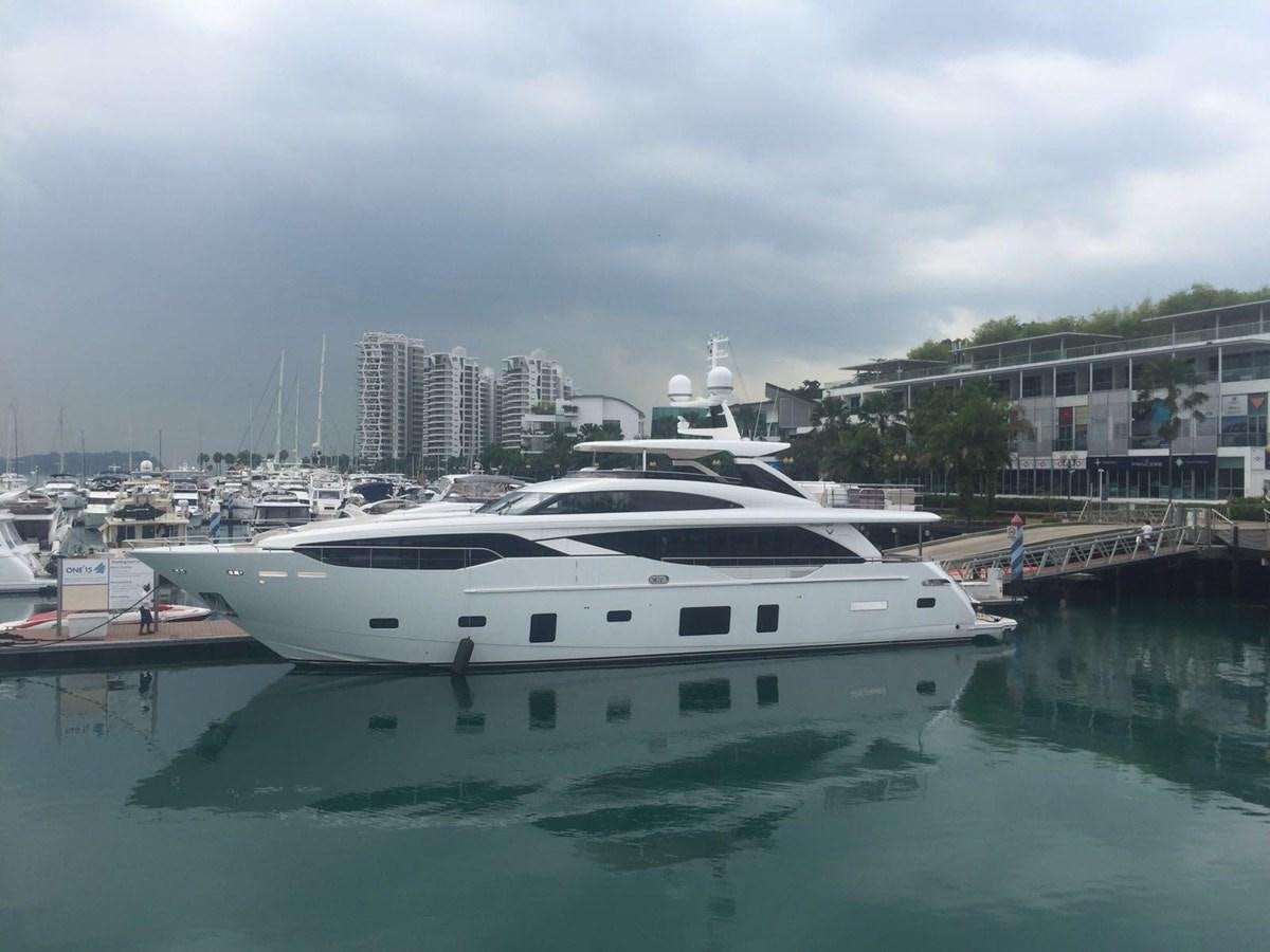 a white yacht in a harbor aboard THE SPIRIT OF ELIJAH Yacht for Sale
