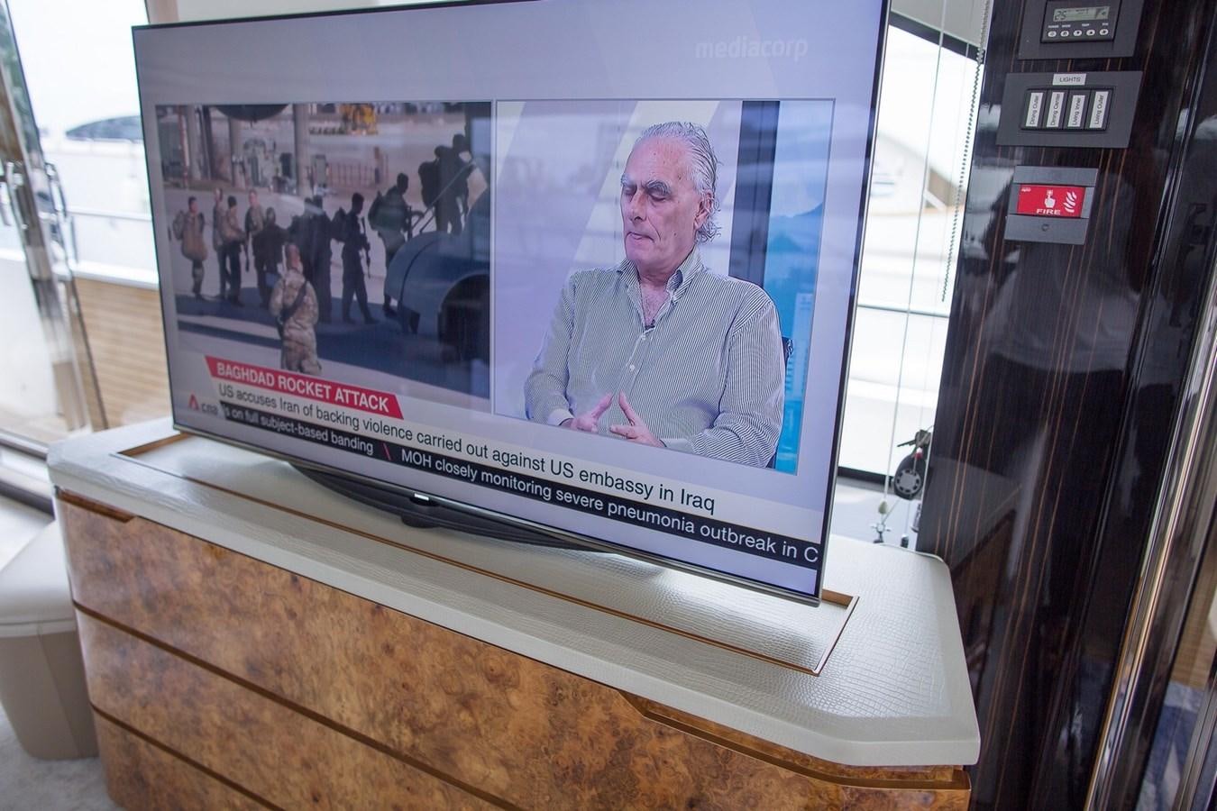 a television screen on a cabinet aboard THE SPIRIT OF ELIJAH Yacht for Sale