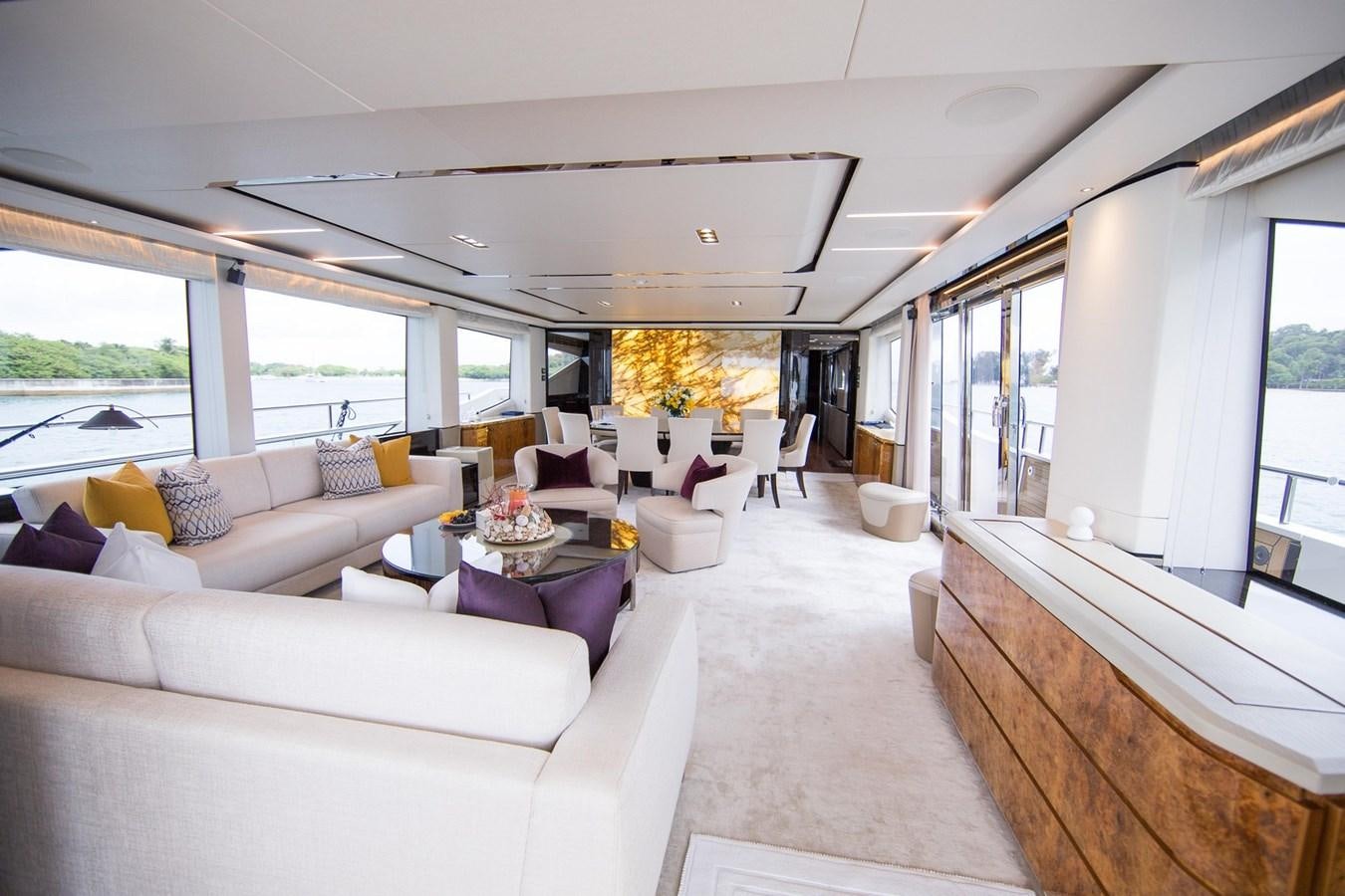 a living room with a large window aboard THE SPIRIT OF ELIJAH Yacht for Sale