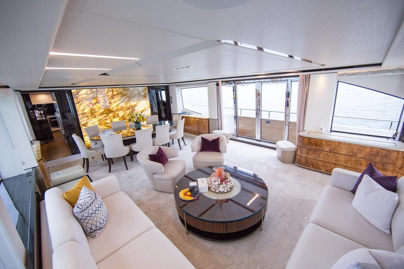 a living room with a large window aboard THE SPIRIT OF ELIJAH Yacht for Sale