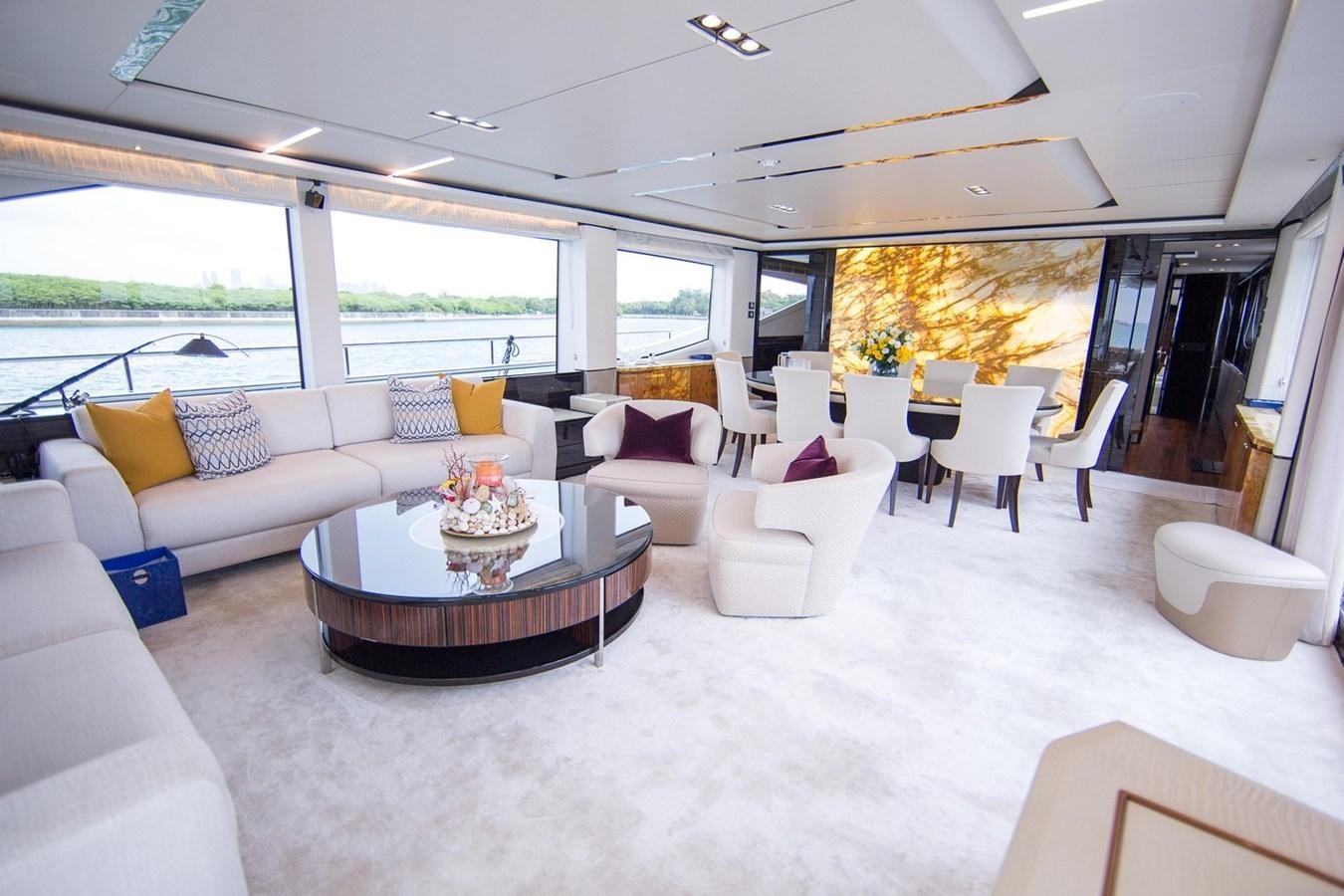 a living room with a large window aboard THE SPIRIT OF ELIJAH Yacht for Sale