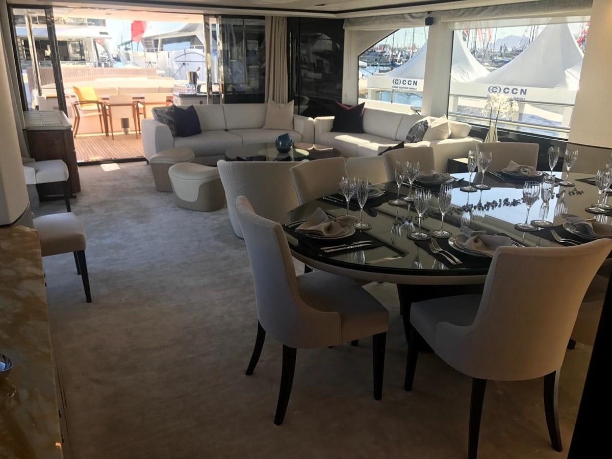 a dining room with a table and chairs aboard THE SPIRIT OF ELIJAH Yacht for Sale