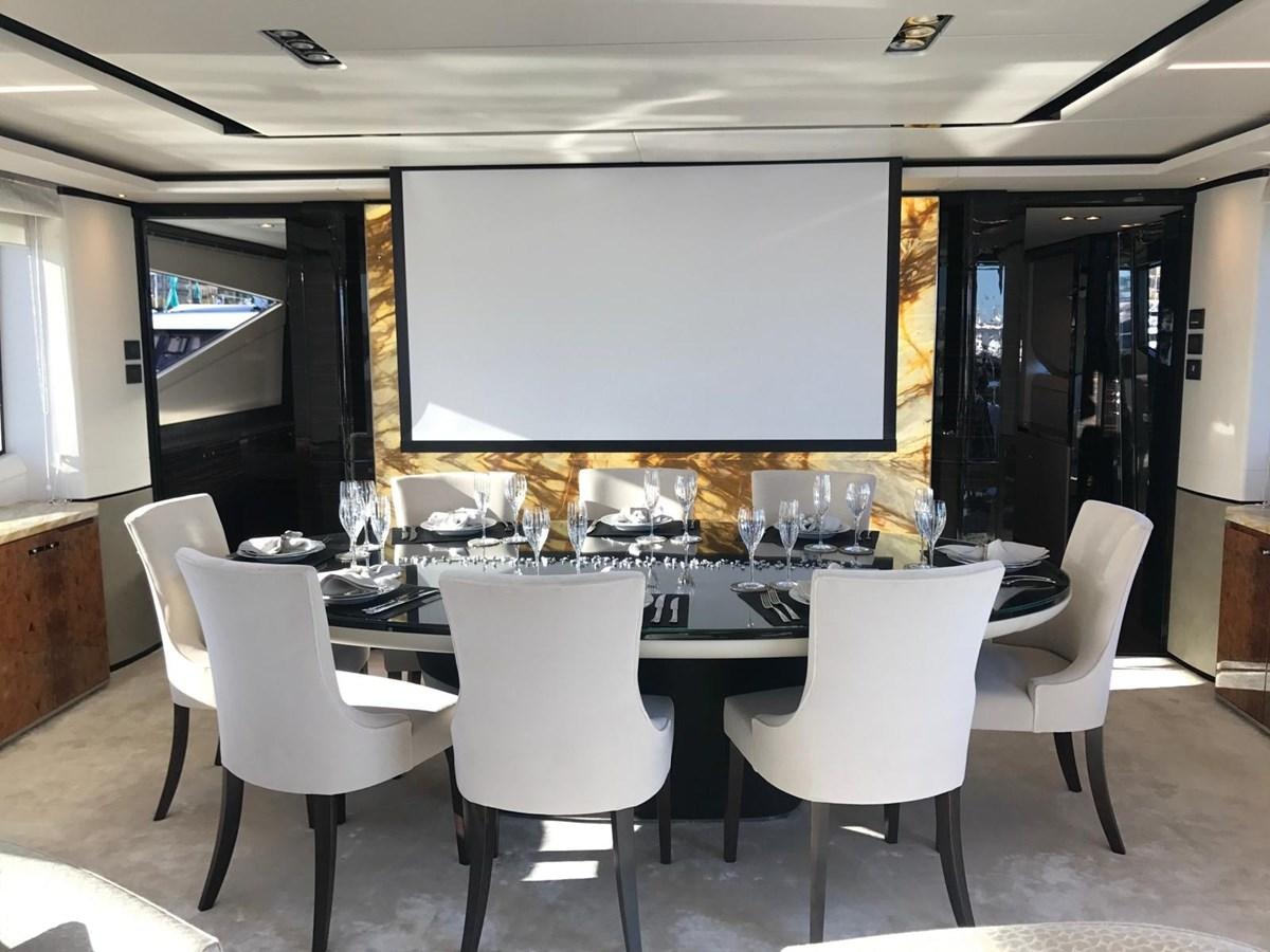 a conference room with a large screen aboard THE SPIRIT OF ELIJAH Yacht for Sale