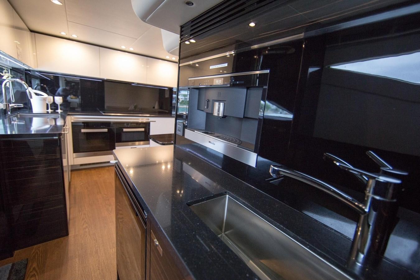 a kitchen with stainless steel appliances aboard THE SPIRIT OF ELIJAH Yacht for Sale