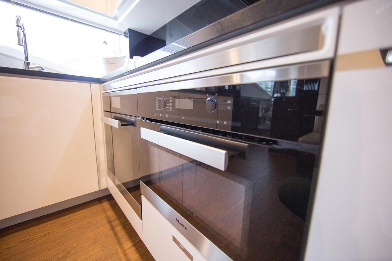 a stainless steel oven in a kitchen aboard THE SPIRIT OF ELIJAH Yacht for Sale