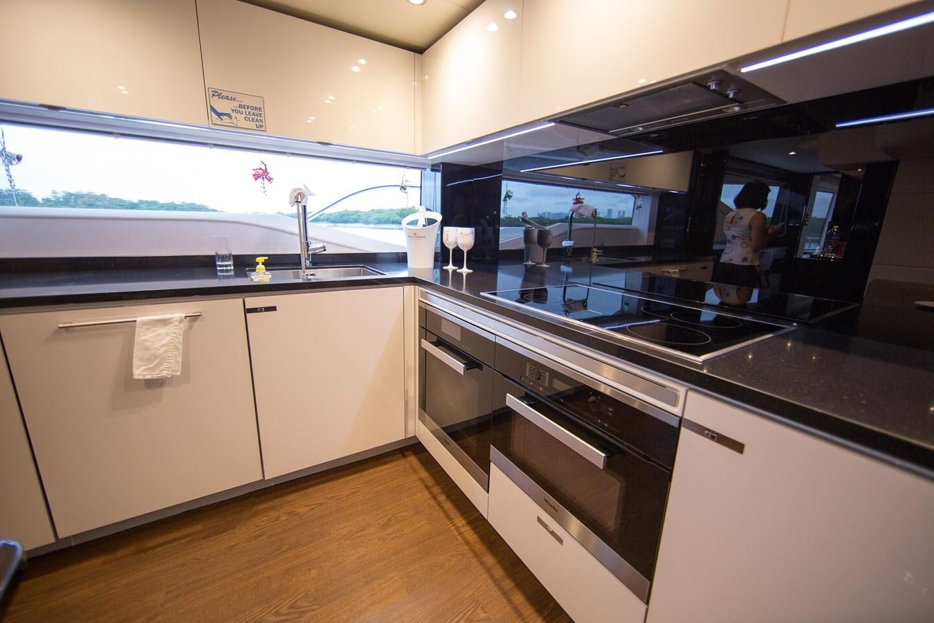 a kitchen with a large island aboard THE SPIRIT OF ELIJAH Yacht for Sale