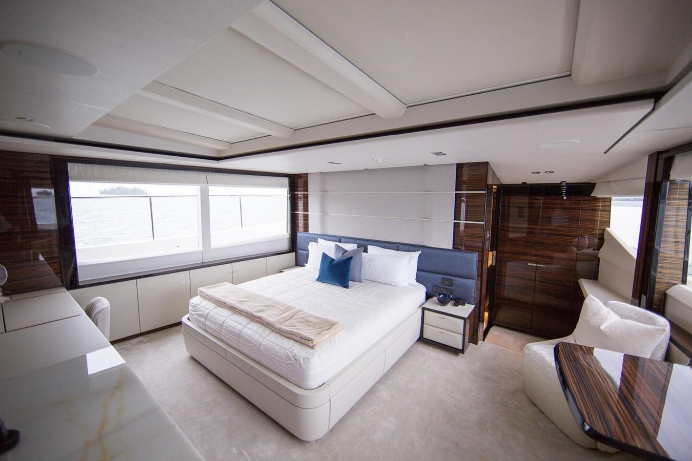 a room with a bed and a tv aboard THE SPIRIT OF ELIJAH Yacht for Sale