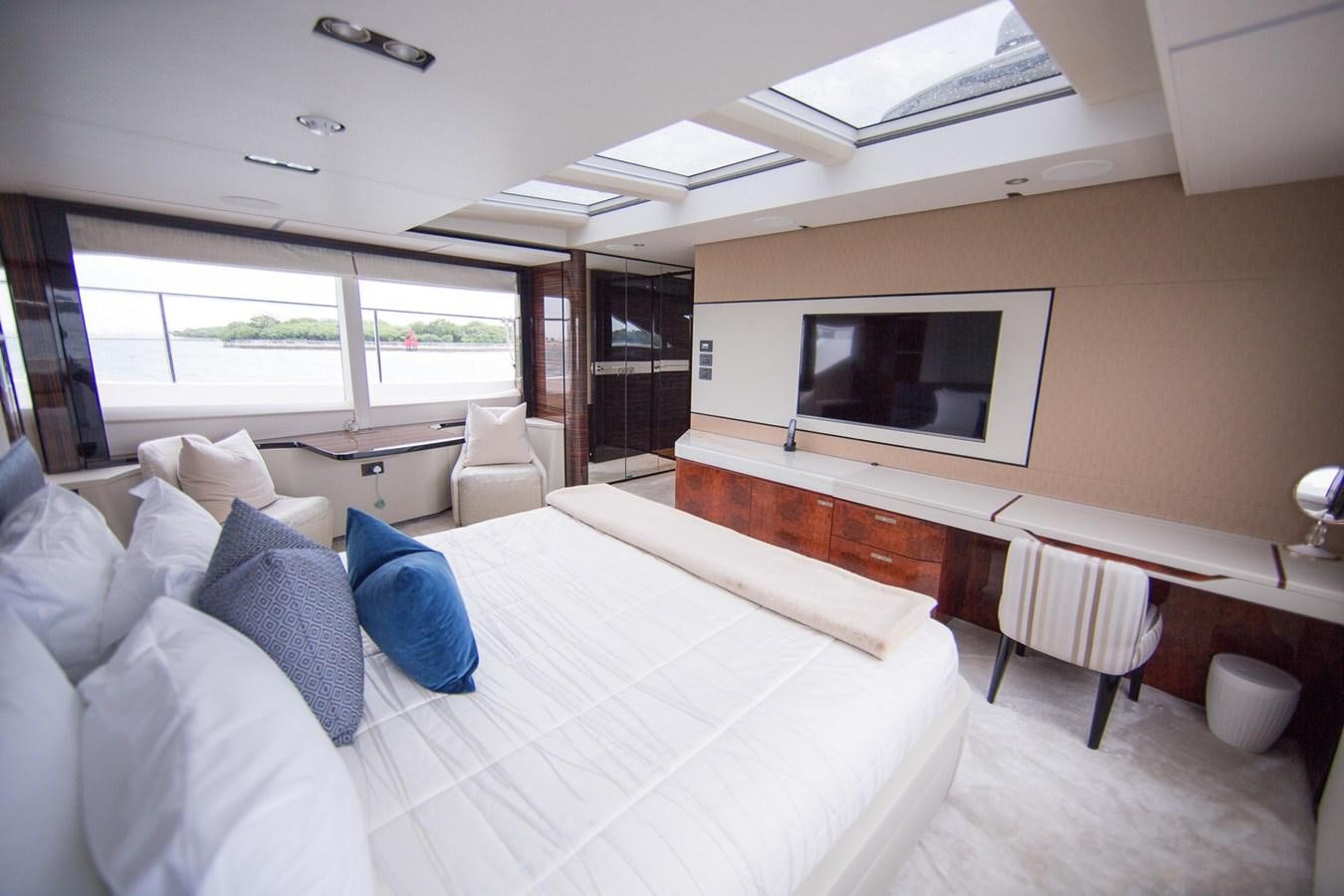 a room with a bed and a tv aboard THE SPIRIT OF ELIJAH Yacht for Sale