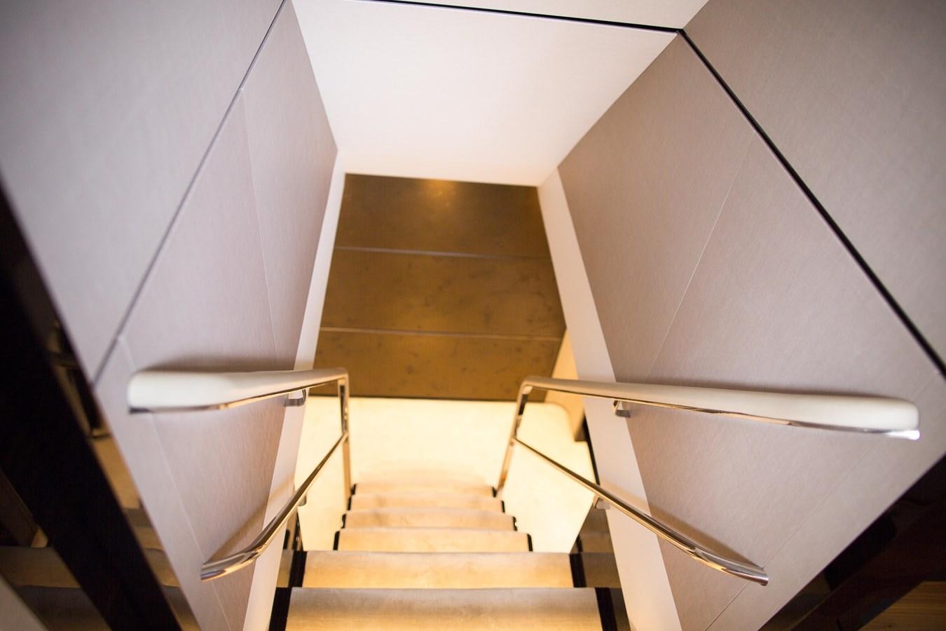 a staircase with a railing aboard THE SPIRIT OF ELIJAH Yacht for Sale