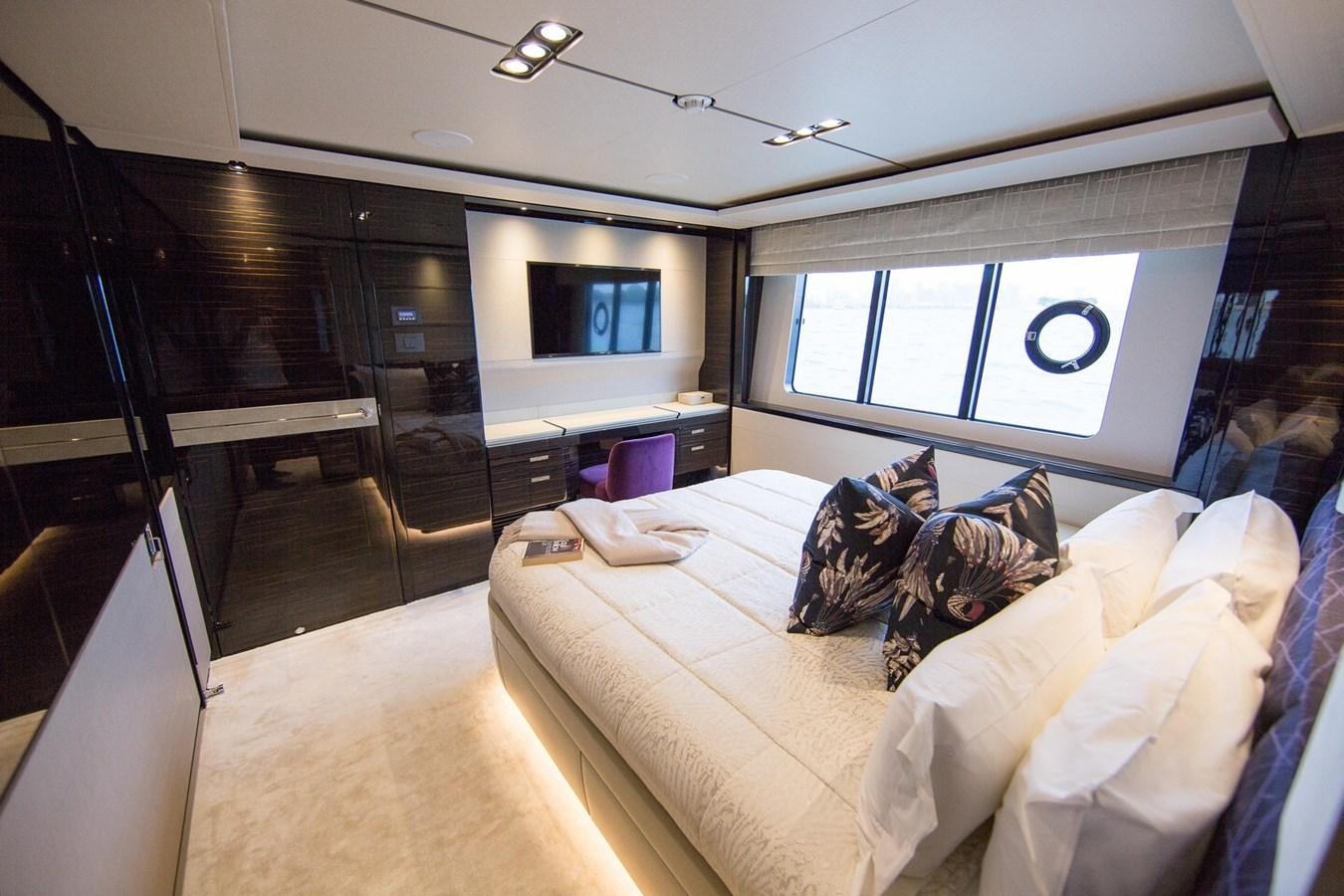 a living room with a large window aboard THE SPIRIT OF ELIJAH Yacht for Sale