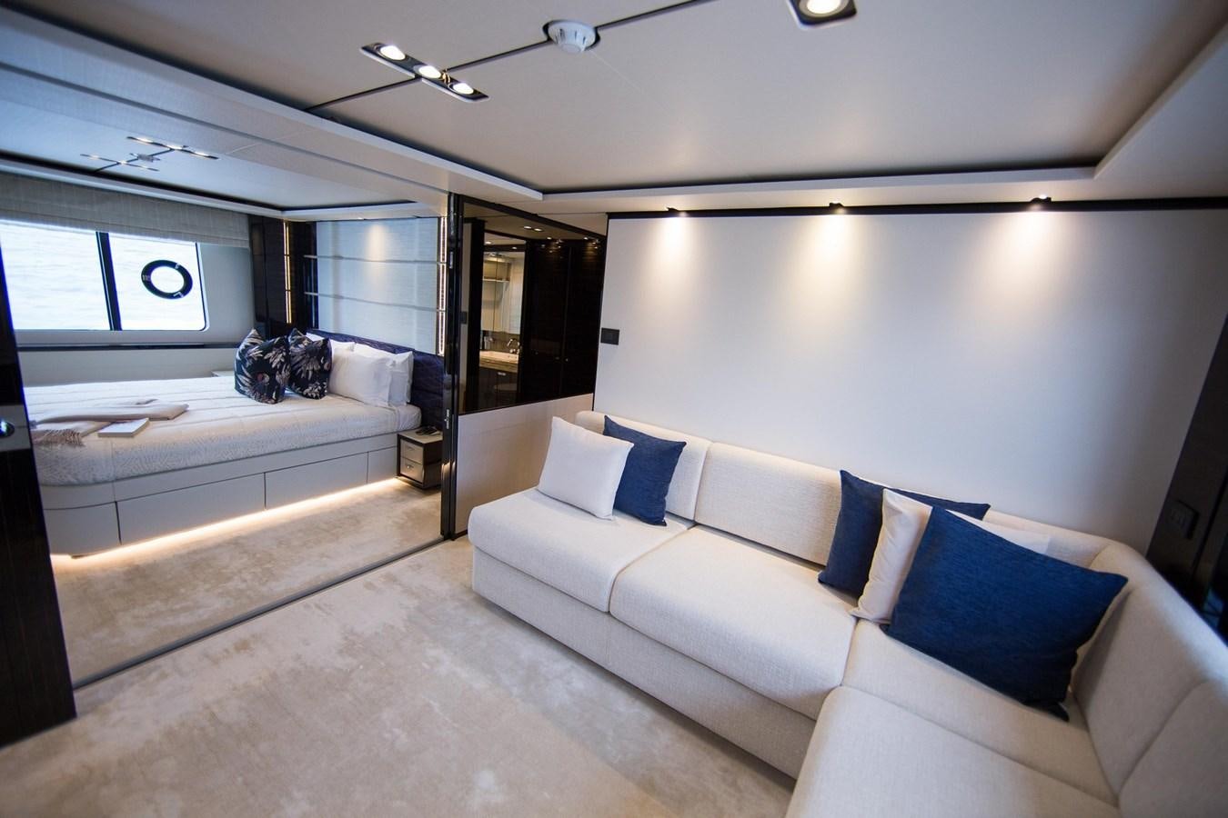 a room with a bed and a couch aboard THE SPIRIT OF ELIJAH Yacht for Sale