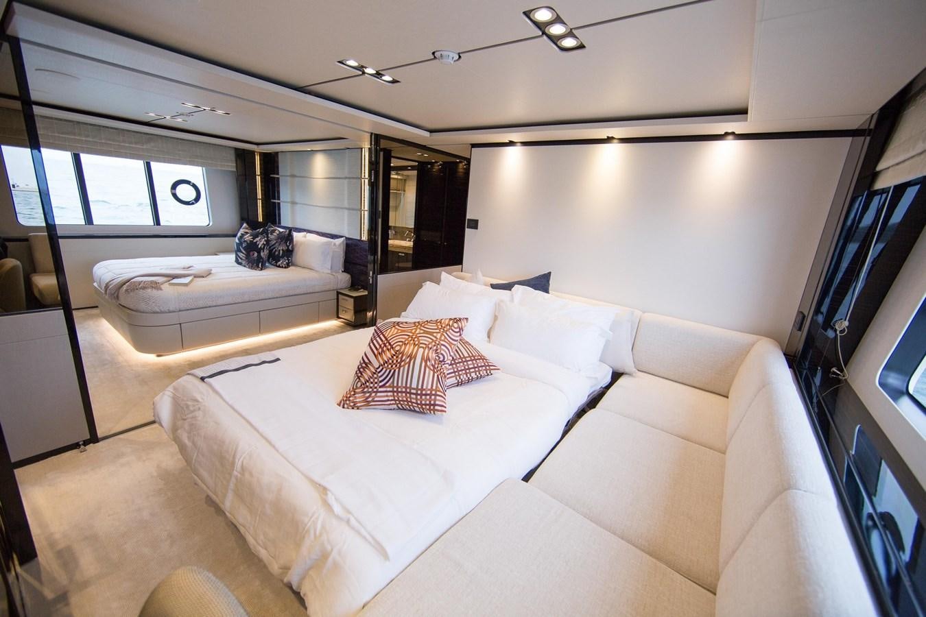 a room with a bed and a tv aboard THE SPIRIT OF ELIJAH Yacht for Sale