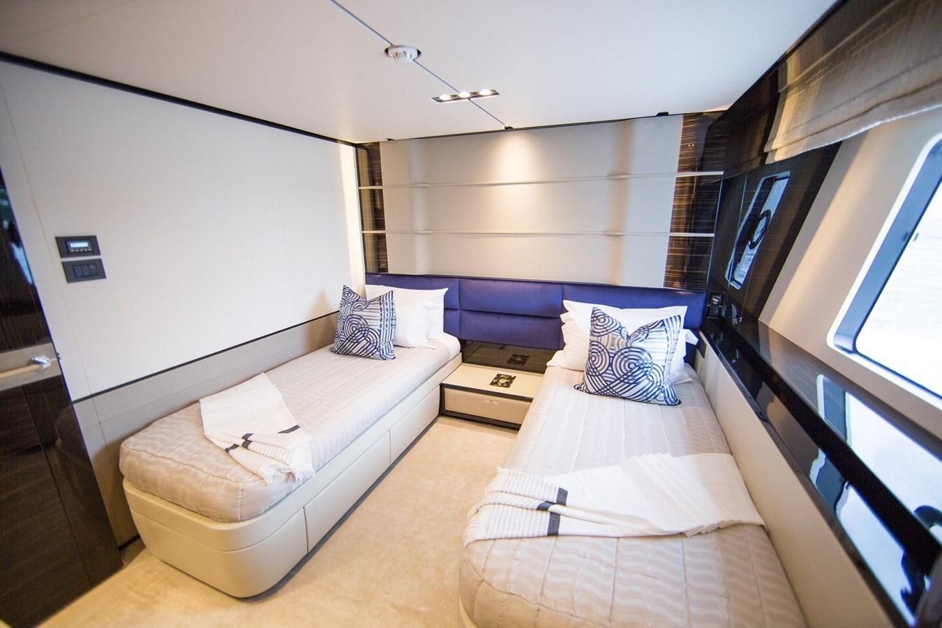 a room with a bed and a couch aboard THE SPIRIT OF ELIJAH Yacht for Sale