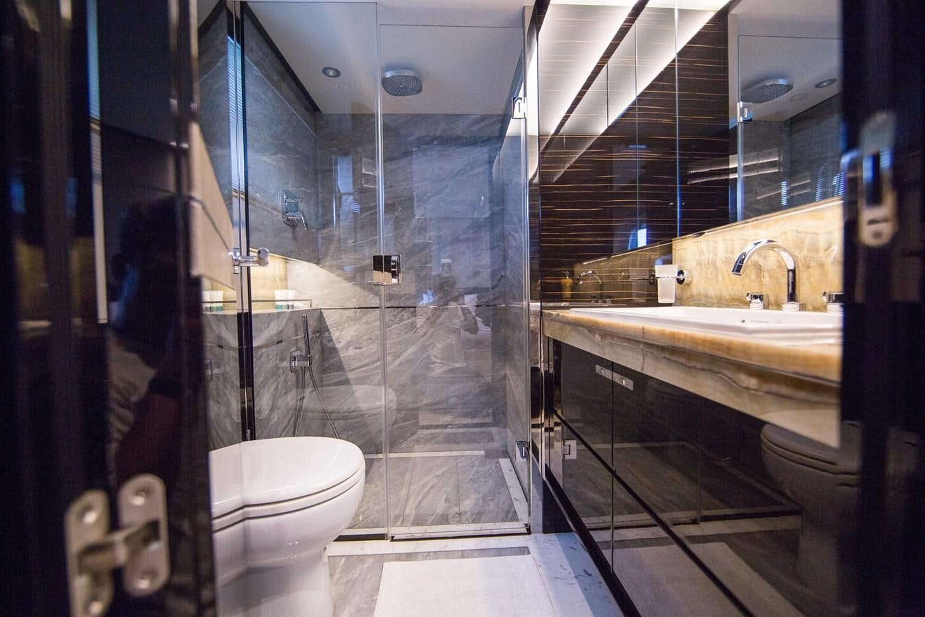a bathroom with a glass shower aboard THE SPIRIT OF ELIJAH Yacht for Sale