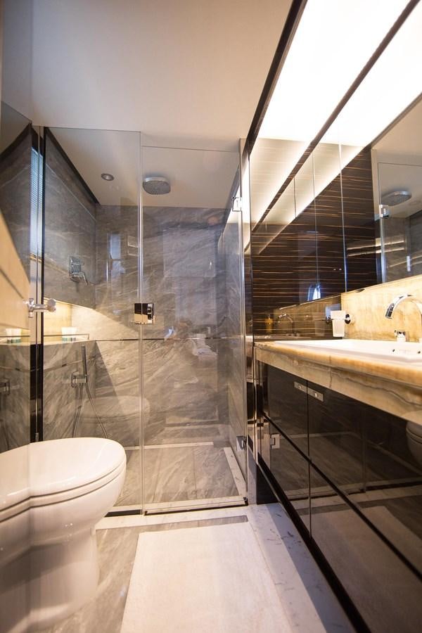 a bathroom with a glass shower aboard THE SPIRIT OF ELIJAH Yacht for Sale