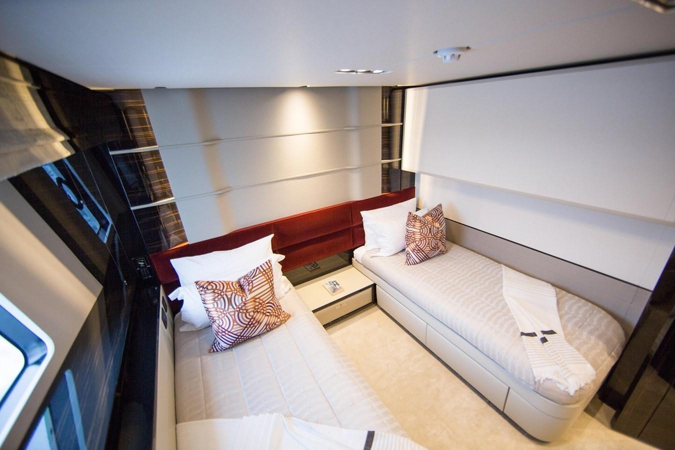 a room with a bed and a pillow aboard THE SPIRIT OF ELIJAH Yacht for Sale