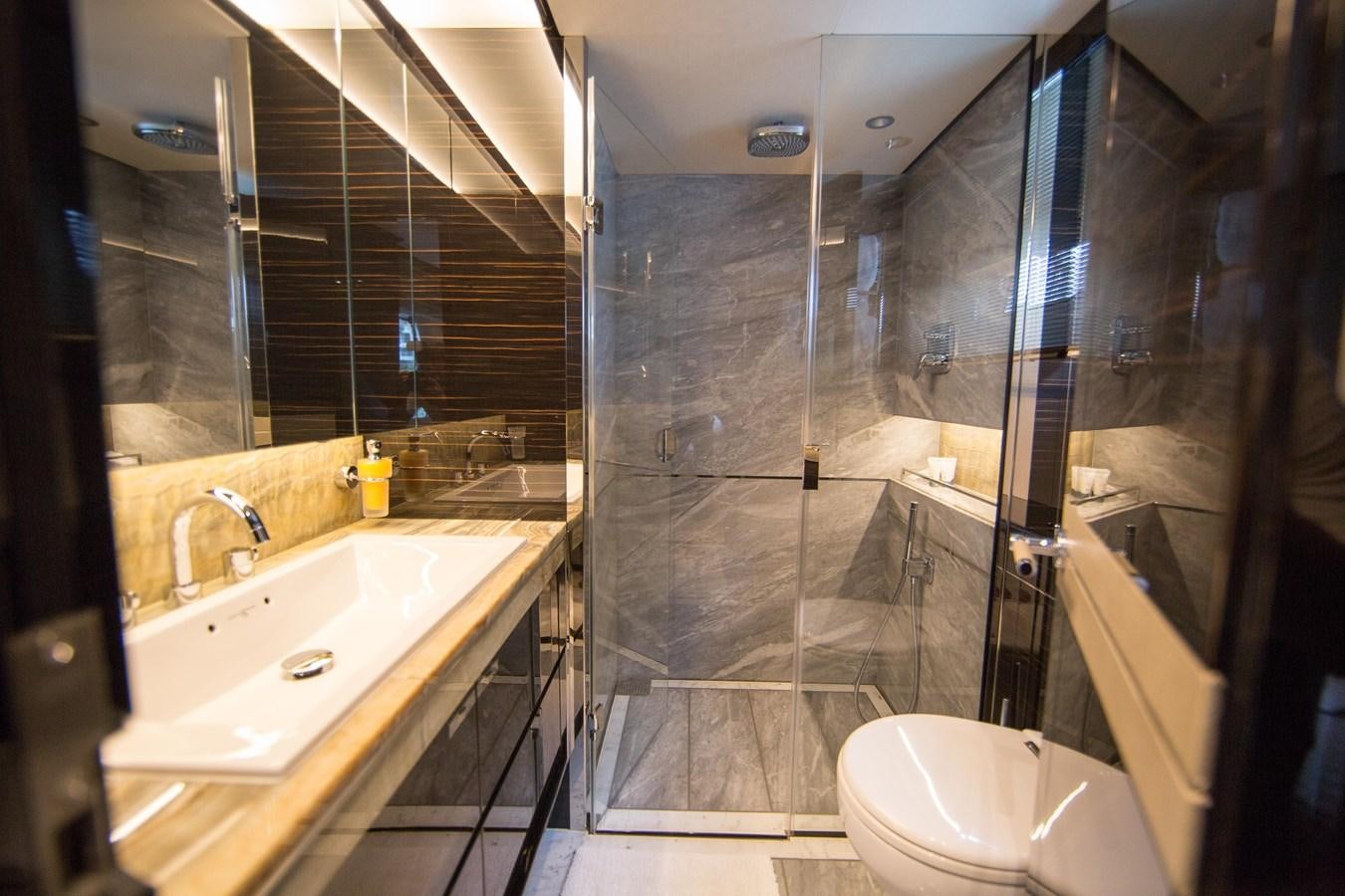 a bathroom with a glass shower aboard THE SPIRIT OF ELIJAH Yacht for Sale
