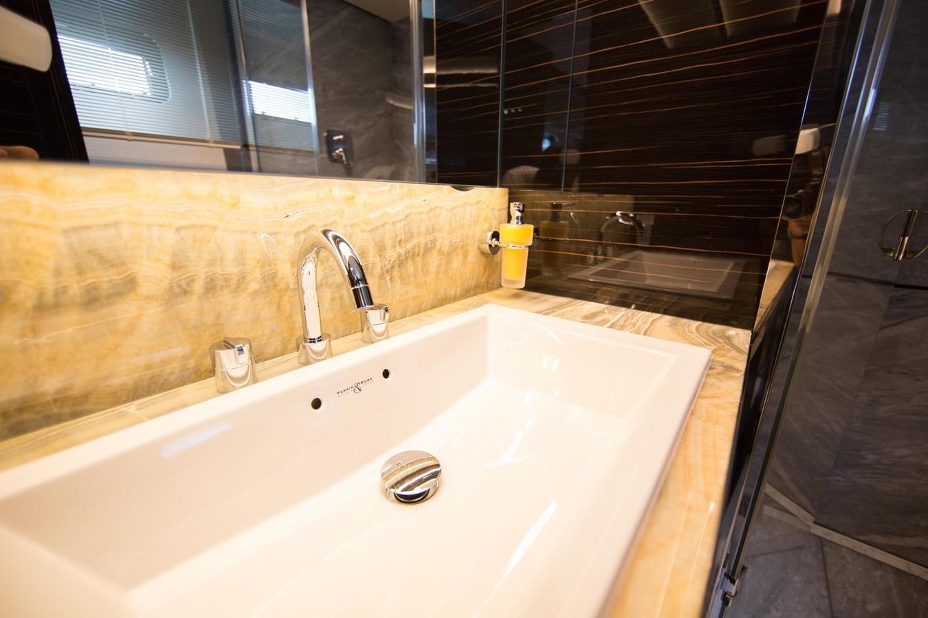 a bathroom with a sink and a shower aboard THE SPIRIT OF ELIJAH Yacht for Sale