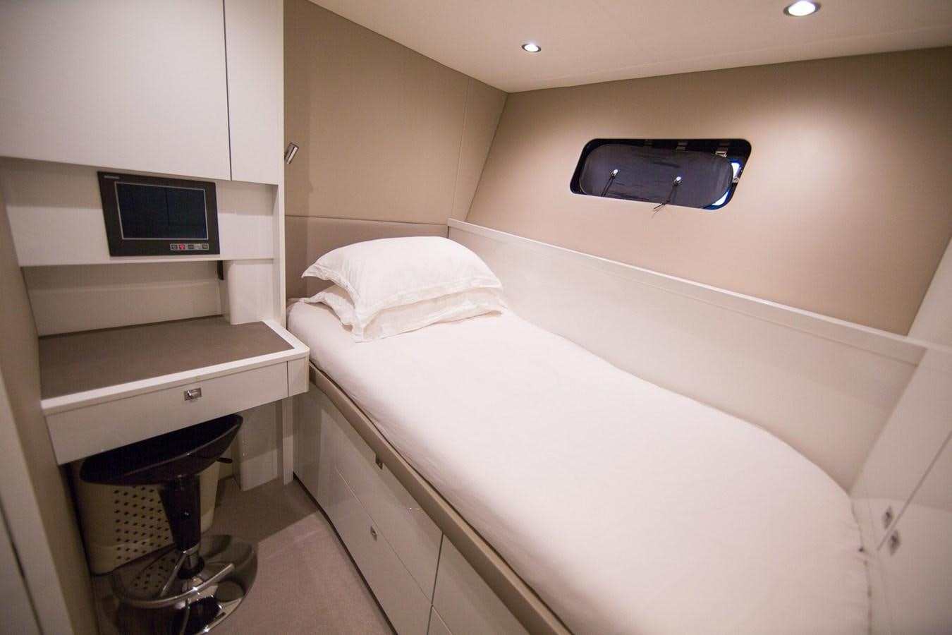 a room with a bed and a television aboard THE SPIRIT OF ELIJAH Yacht for Sale