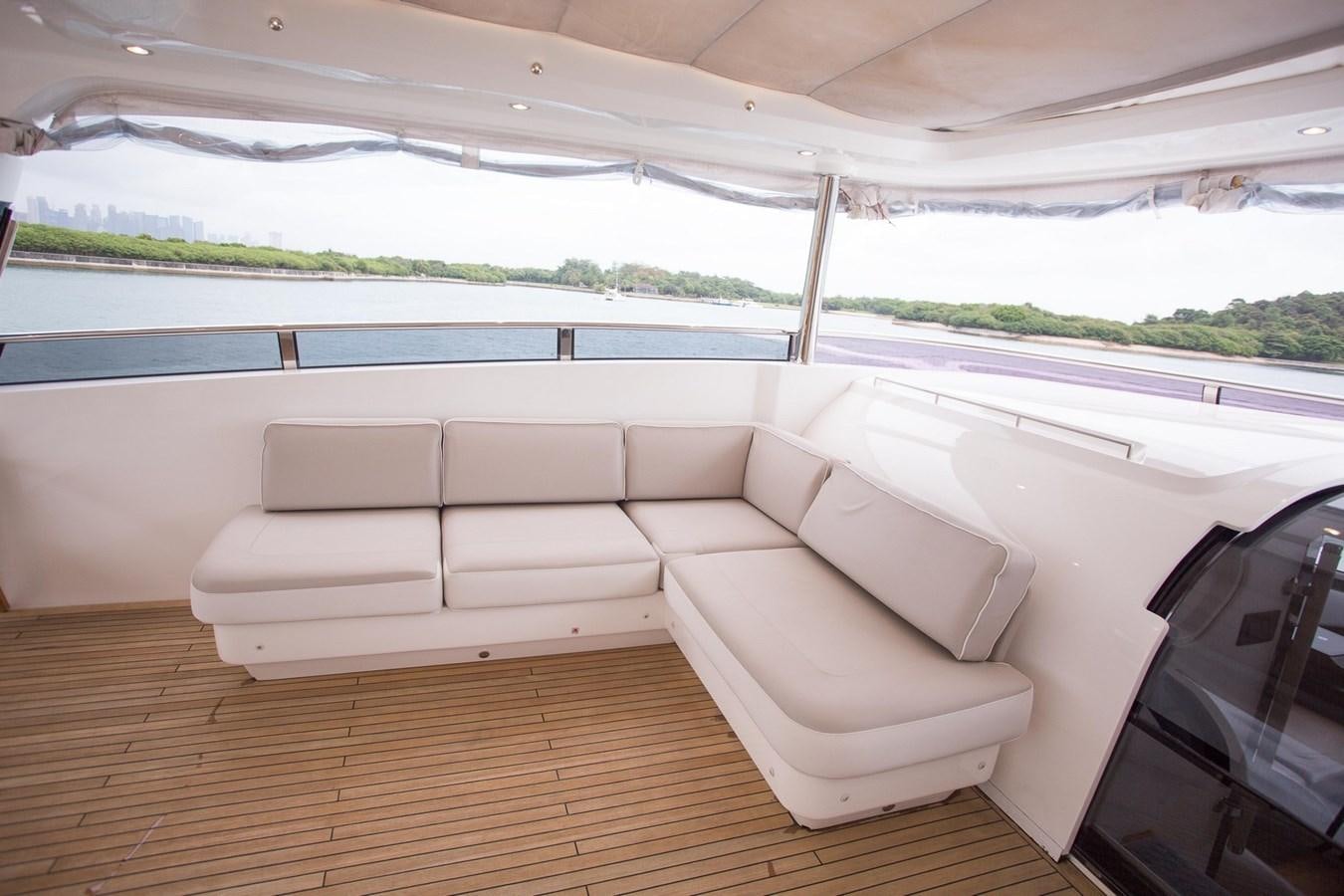 a room with a couch and a pool aboard THE SPIRIT OF ELIJAH Yacht for Sale