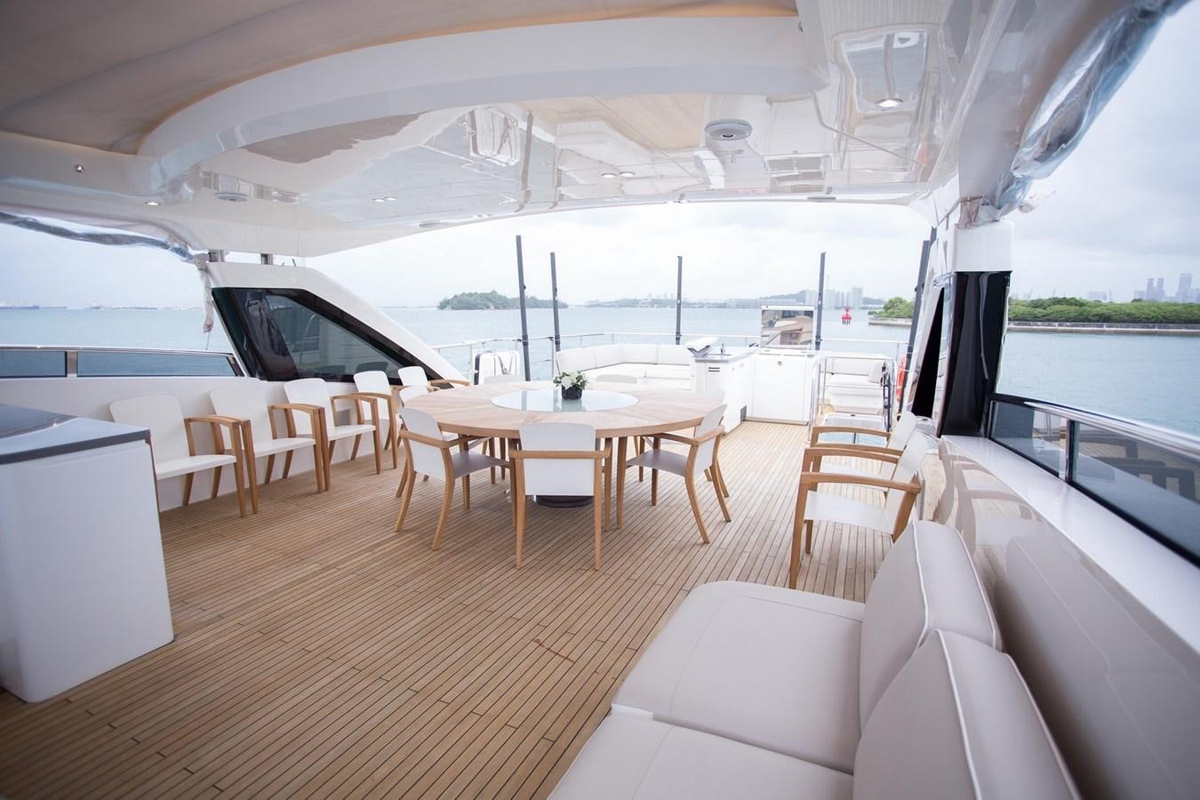 a room with a table chairs and a large window aboard THE SPIRIT OF ELIJAH Yacht for Sale