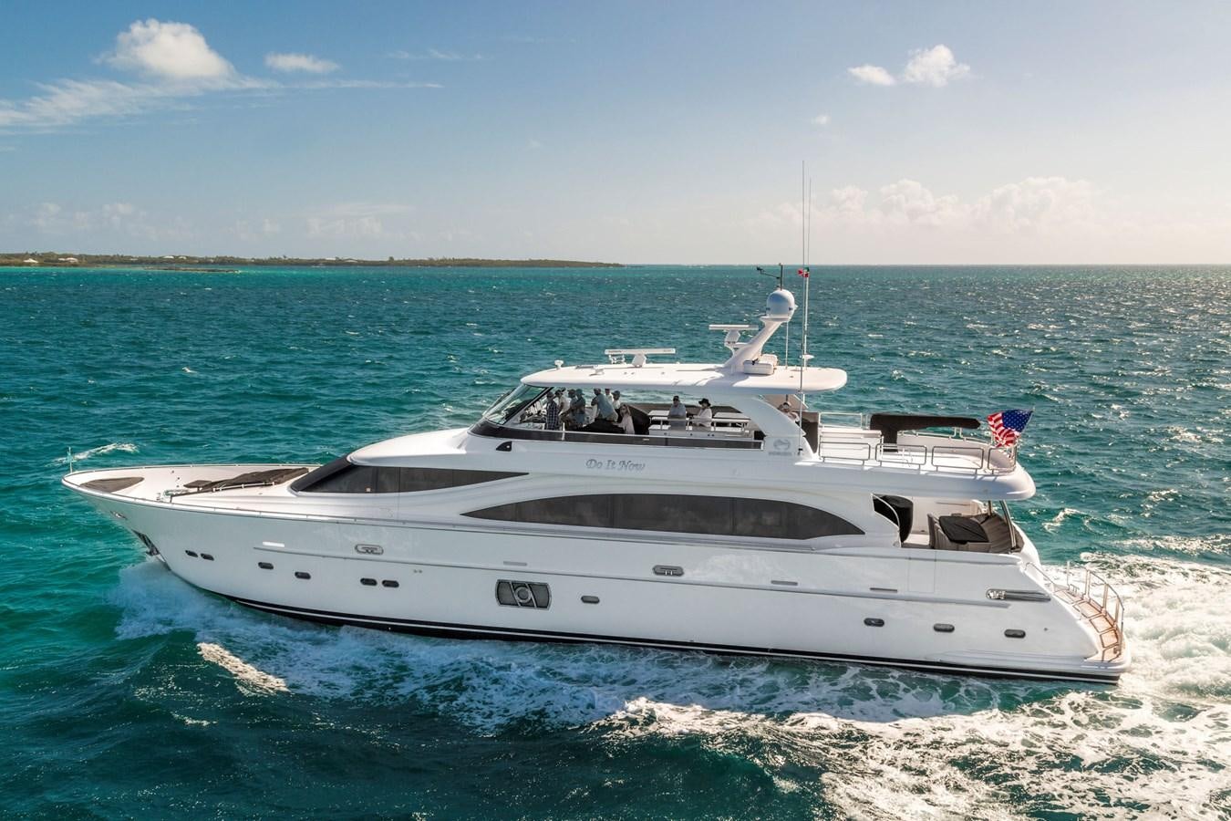 a white yacht on the beach aboard E100 (NEW SPEC BOAT)  Yacht for Sale