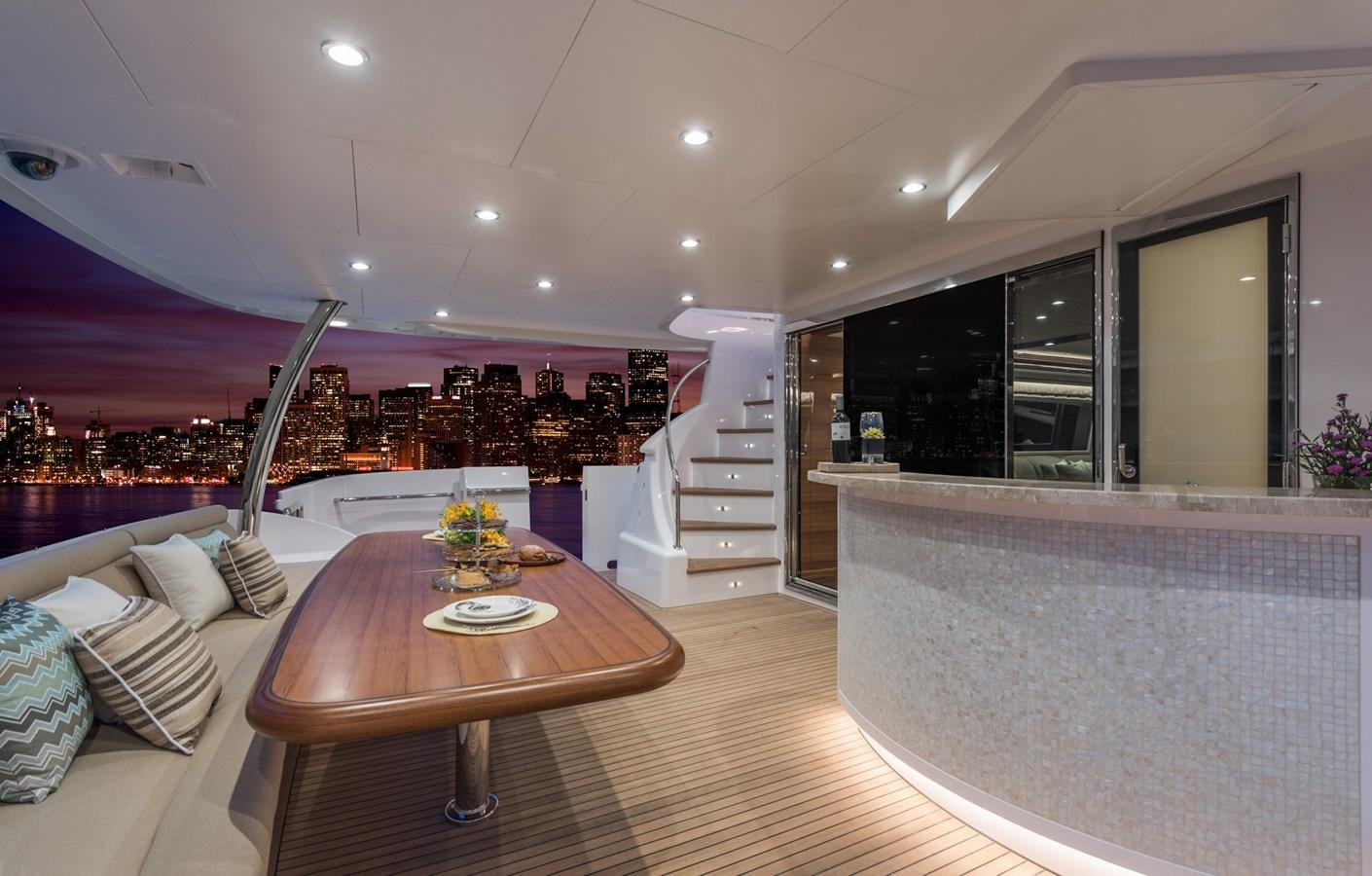 a large living room with a large table and a staircase aboard E100 (NEW SPEC BOAT)  Yacht for Sale