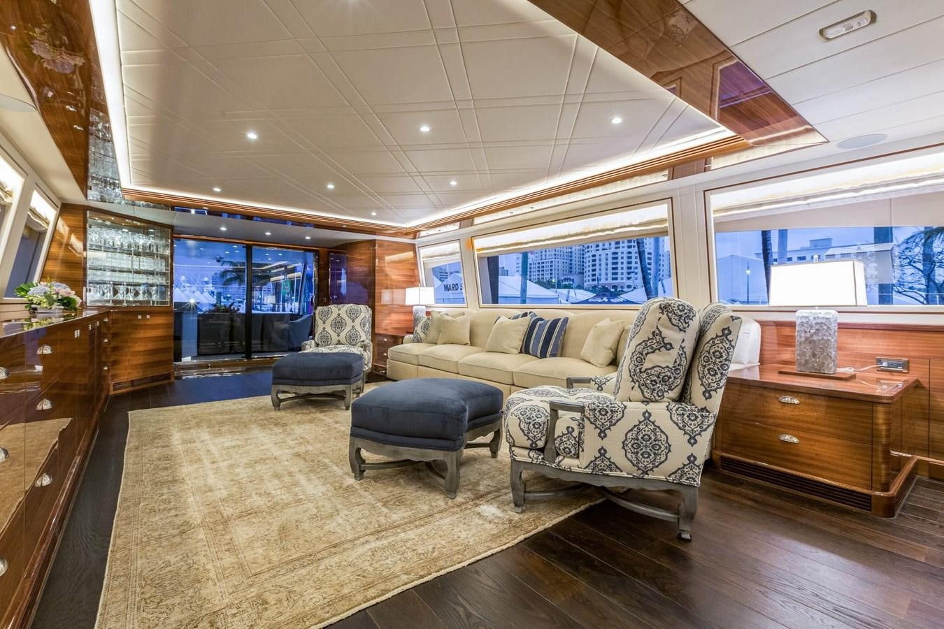 a living room with a large window aboard E100 (NEW SPEC BOAT)  Yacht for Sale