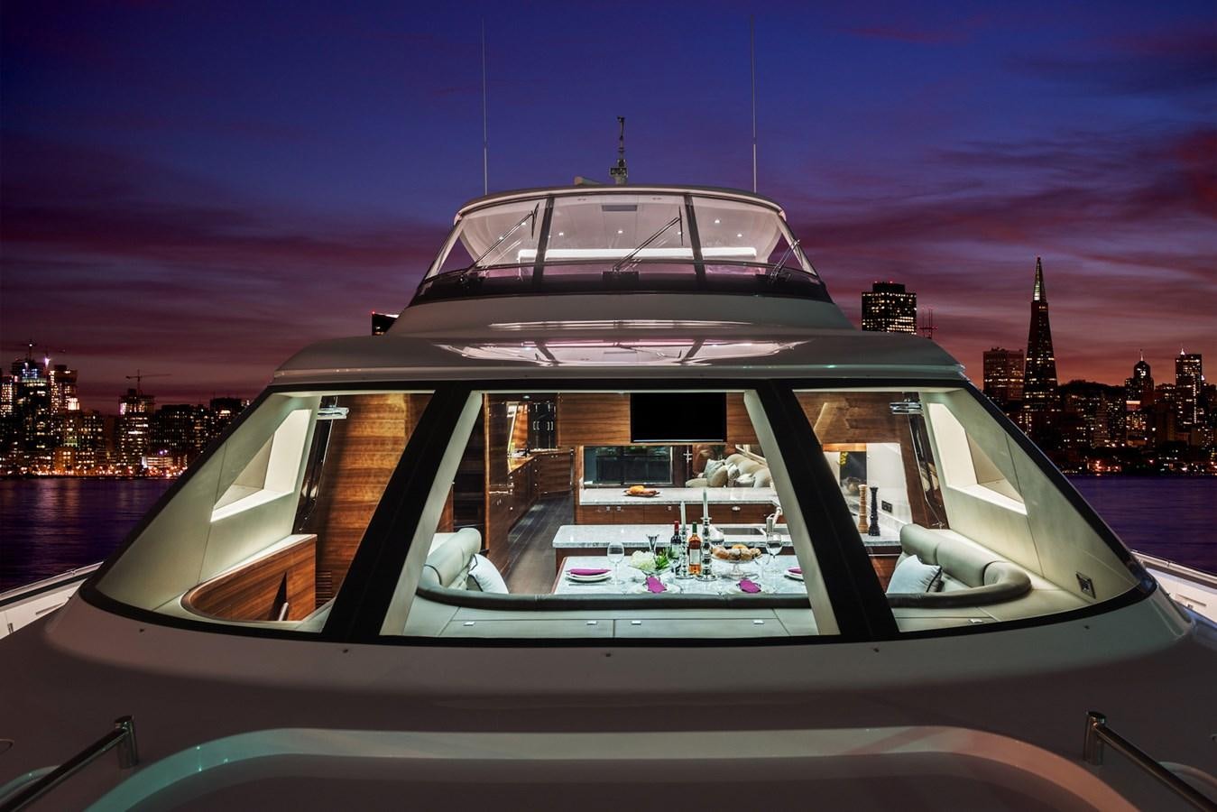 a car with a view of a city at night aboard E100 (NEW SPEC BOAT)  Yacht for Sale
