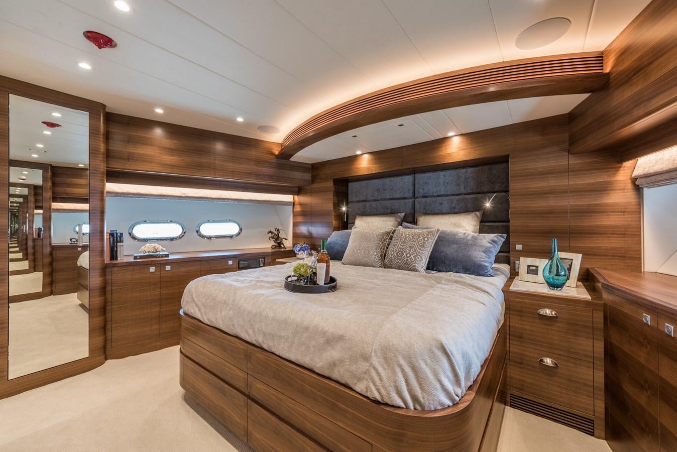 a large bed in a room aboard E100 (NEW SPEC BOAT)  Yacht for Sale