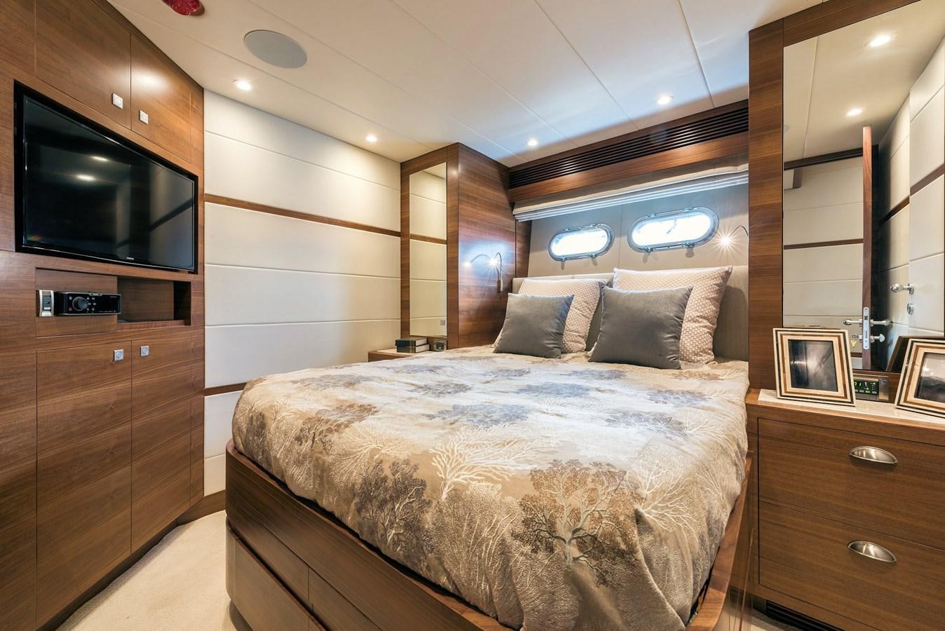 a bed in a room aboard E100 (NEW SPEC BOAT)  Yacht for Sale