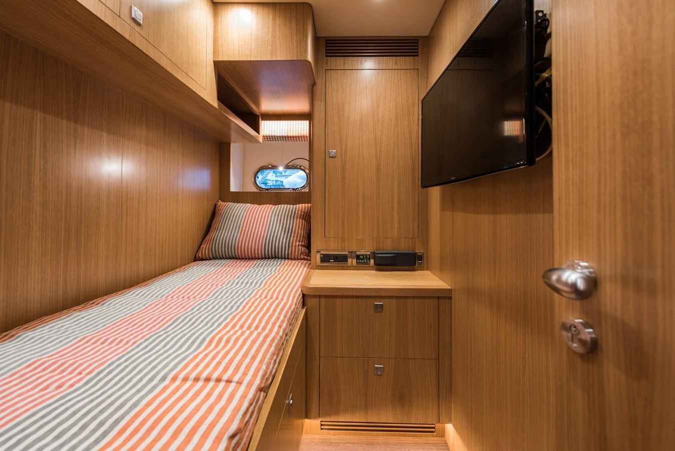 a bedroom with a bed and a television aboard E100 (NEW SPEC BOAT)  Yacht for Sale