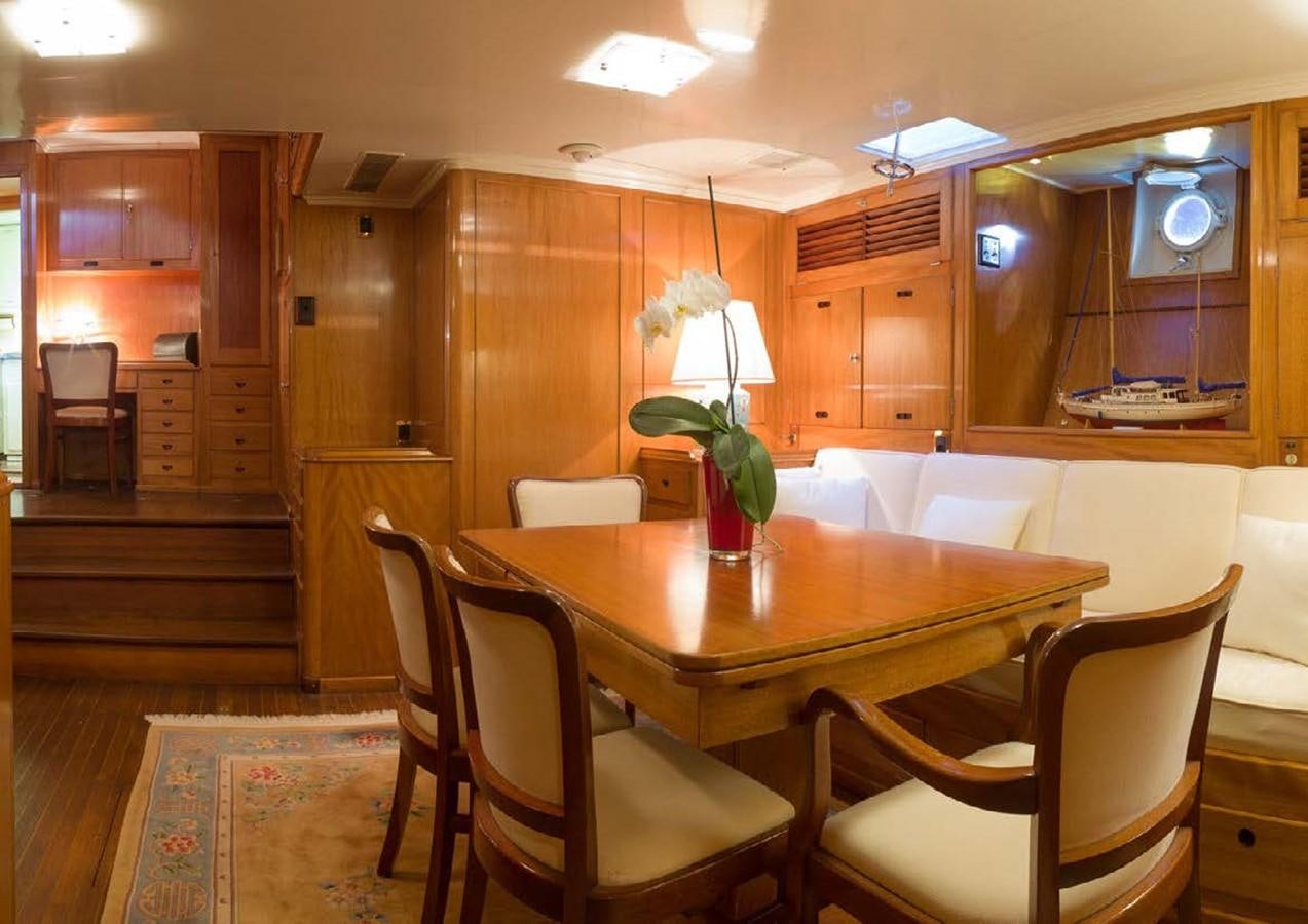 a dining table in a kitchen aboard FEI-SEEN Yacht for Sale